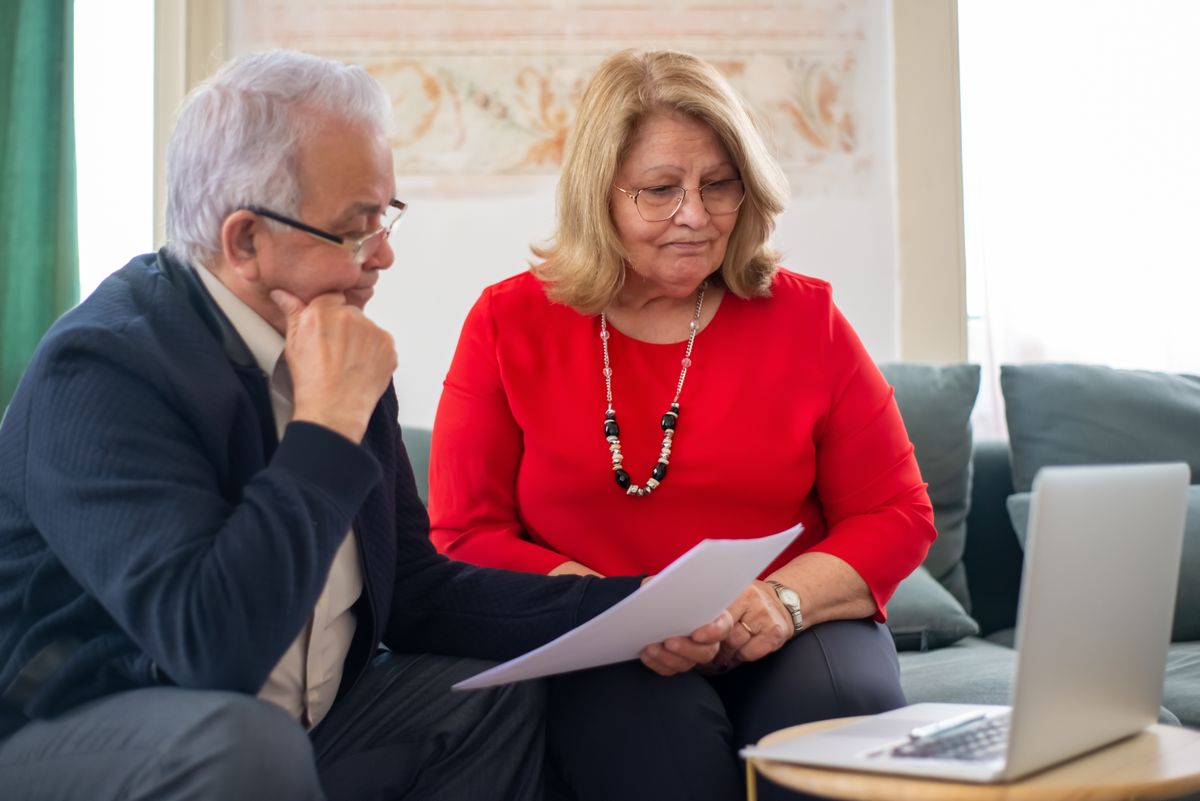 Couple planning health insurance costs after the subsidy cliff returned