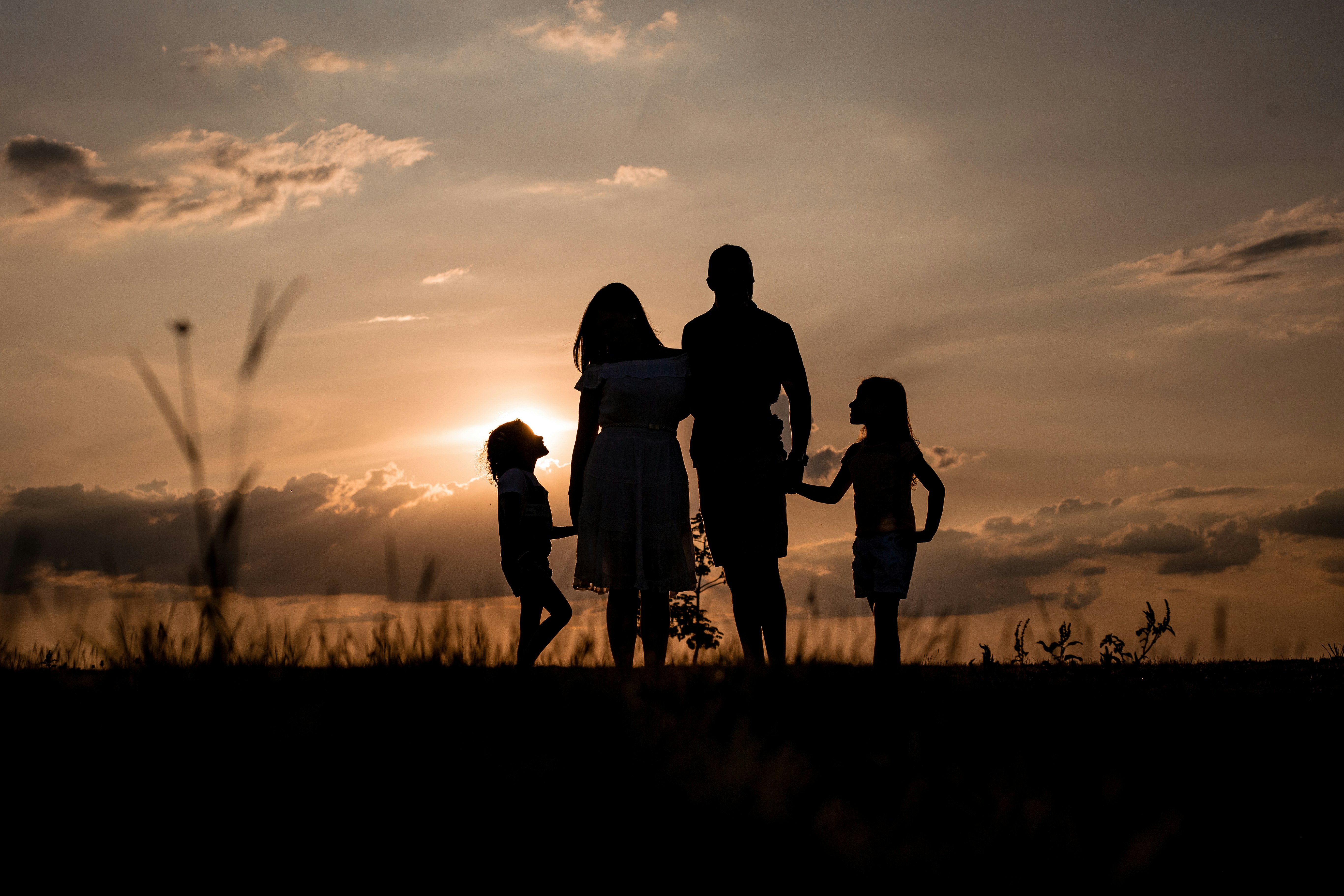 Family considering how new health insurance laws affect their coverage